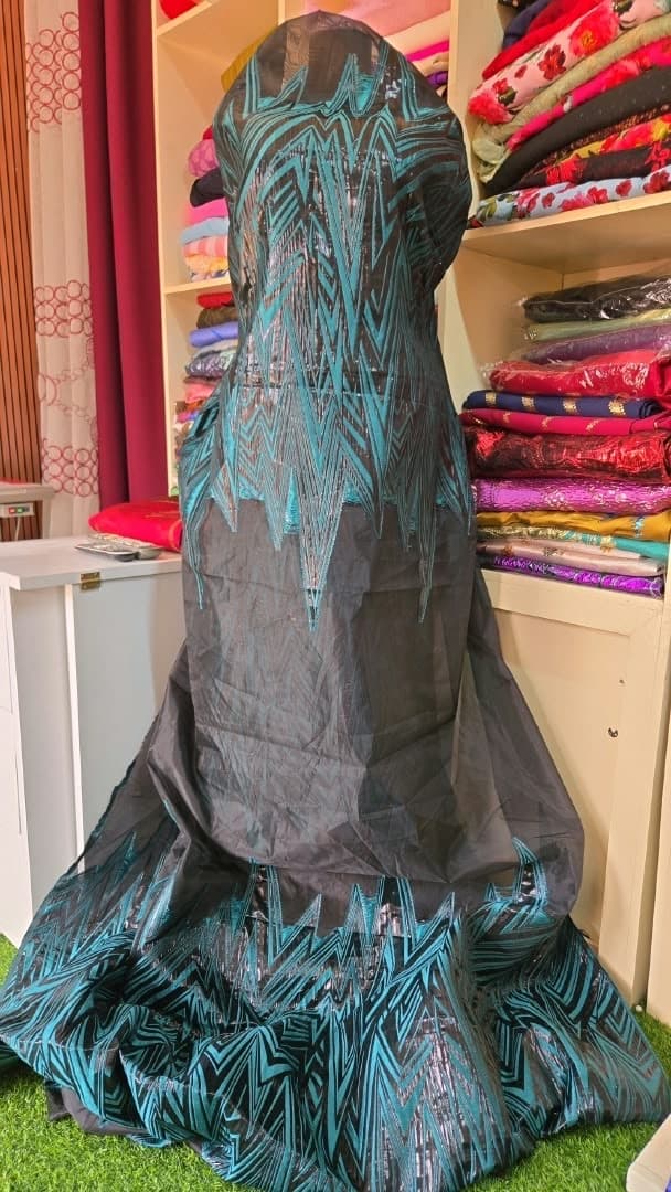 Peacock Spear — Teal Sequin Embroidered Net Lace